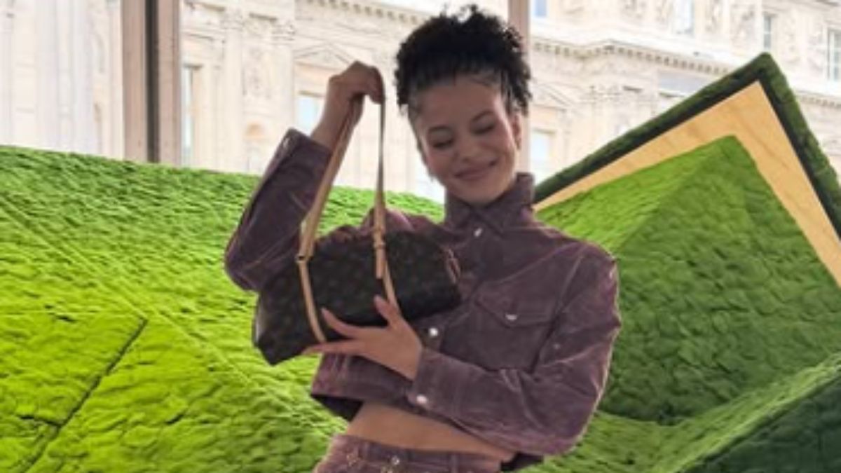 Chase Infiniti’s Multicolored Fringe Dress Is A Bold Plunging Statement Worth Copying