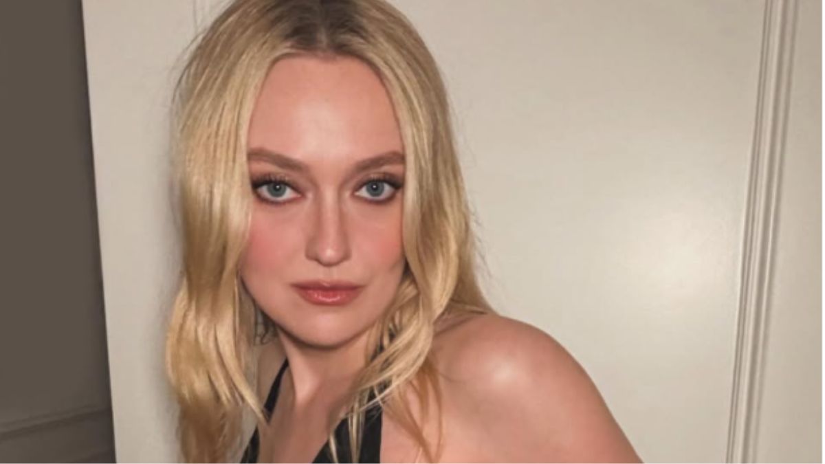 Dakota Fanning’s Zebra-Print Fendi Bag Is the Only Accessory a Black Suit Needs