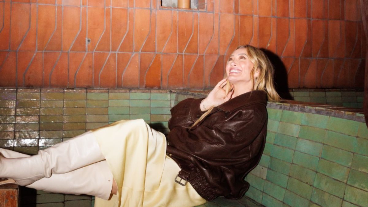 Hilary Duff’s Butter-Yellow Slip Dress and Brown Leather Jacket Is the Album-Release Party Look Worth Stealing