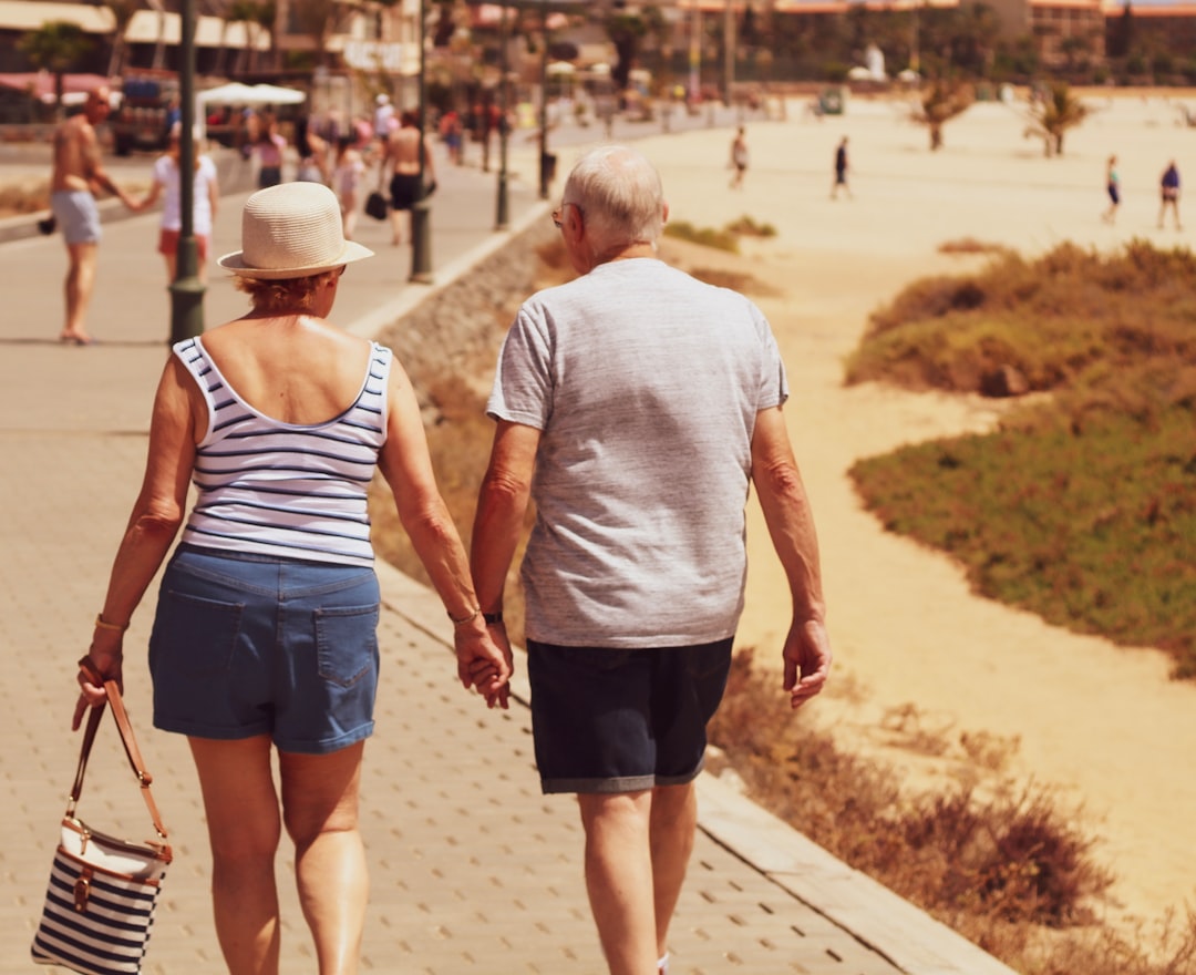 Elderly Couple Holding Hands