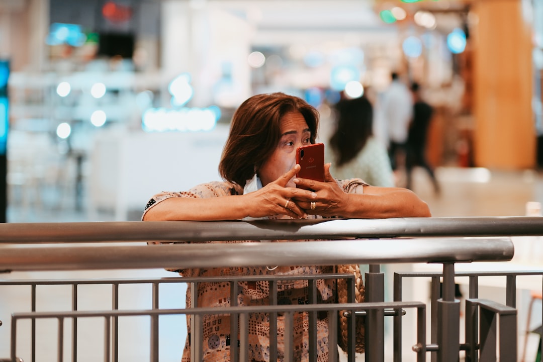 Distracted Shopper With Phone