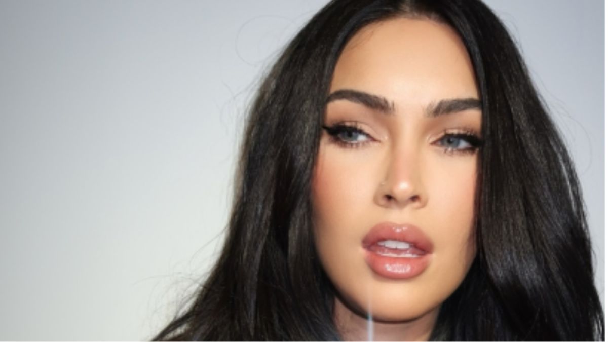 Megan Fox’s Black Mini Dress and Garter Look at the Oscars After-Party Is Unapologetically Bold