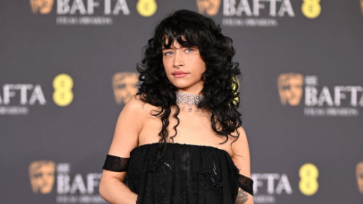Odessa A’zion’s Gothic Sheer Lace Dior Dress Is A Dramatic BAFTA Red Carpet Statement