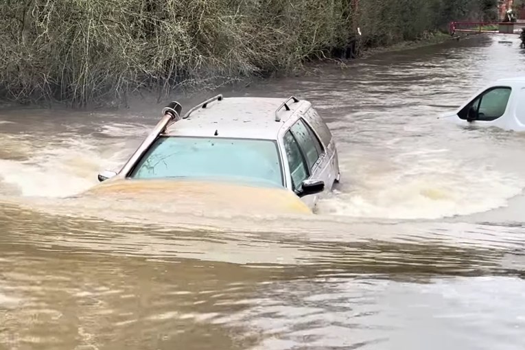 Watch How an Old Peugeot Conquers Deep Water Obstacles