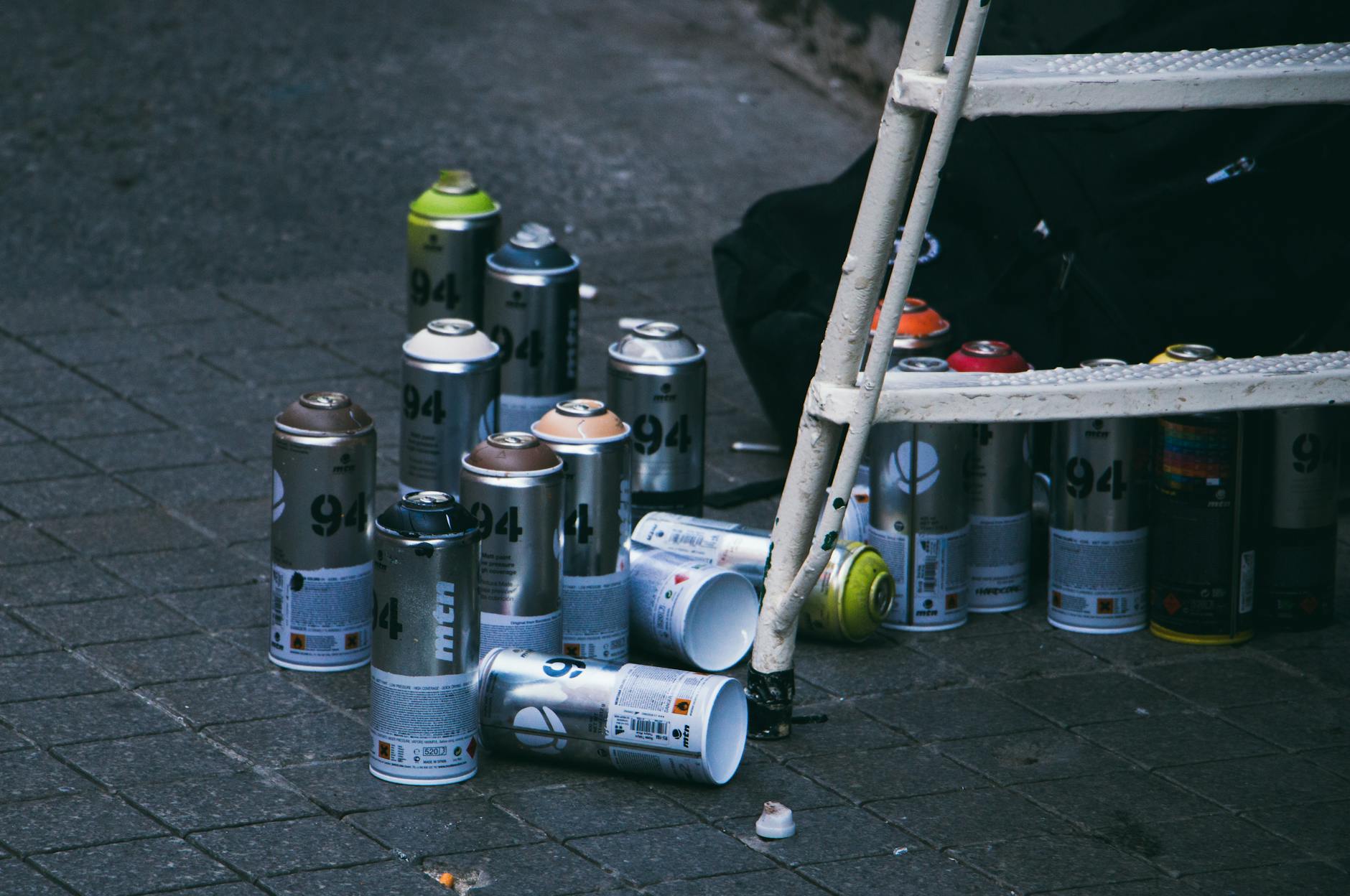 Unsealed Paint Cans