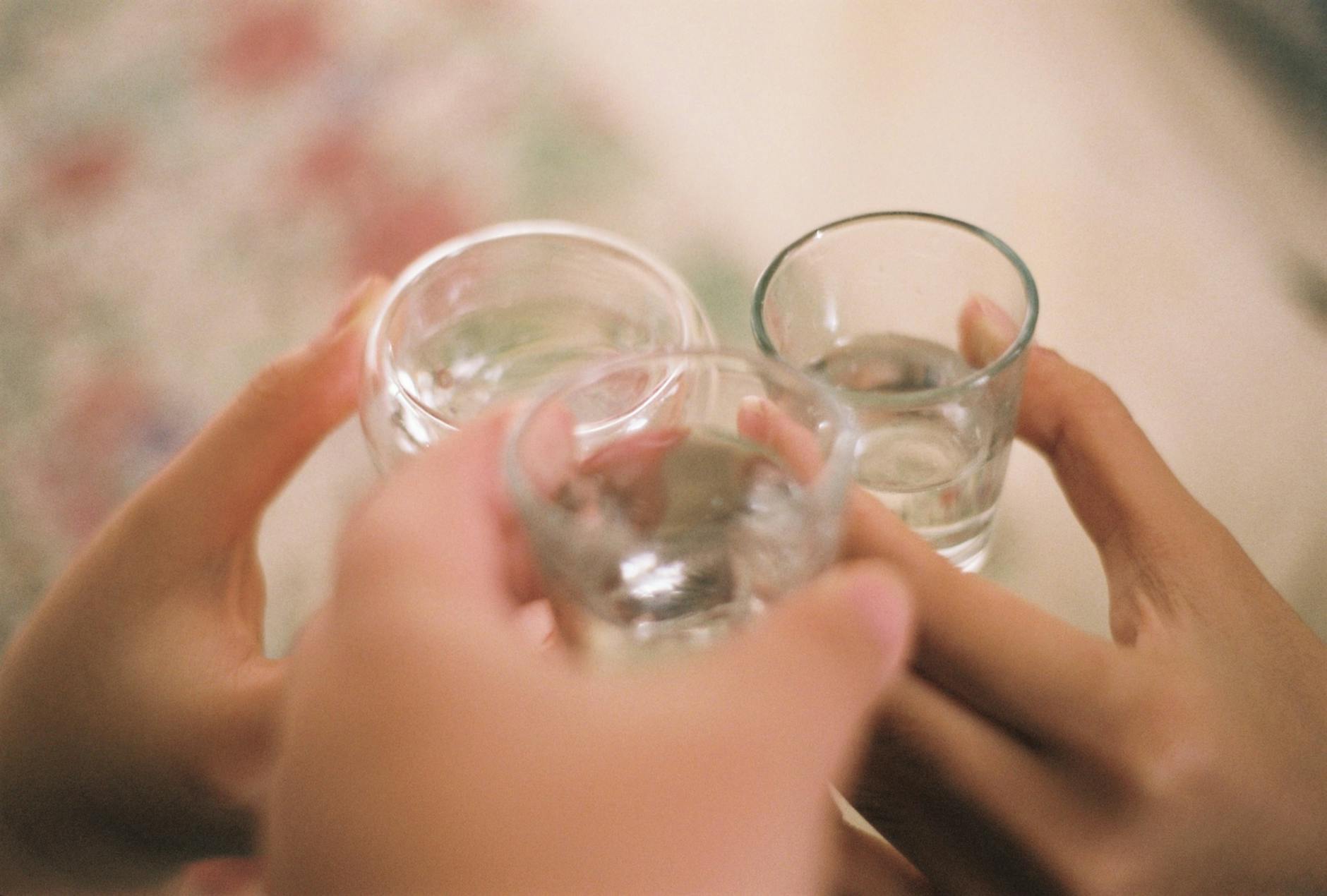 Water Glasses Toasting