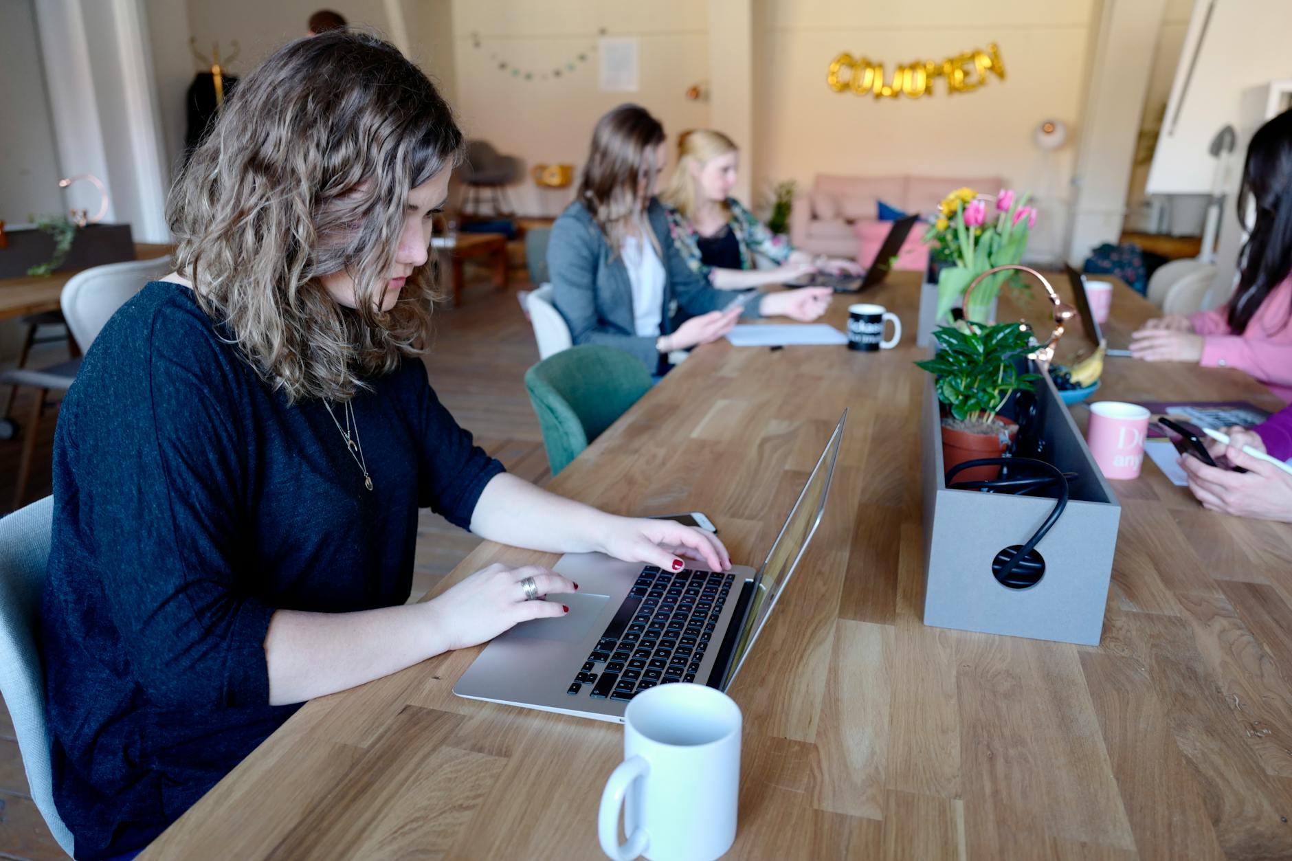 women working on laptop