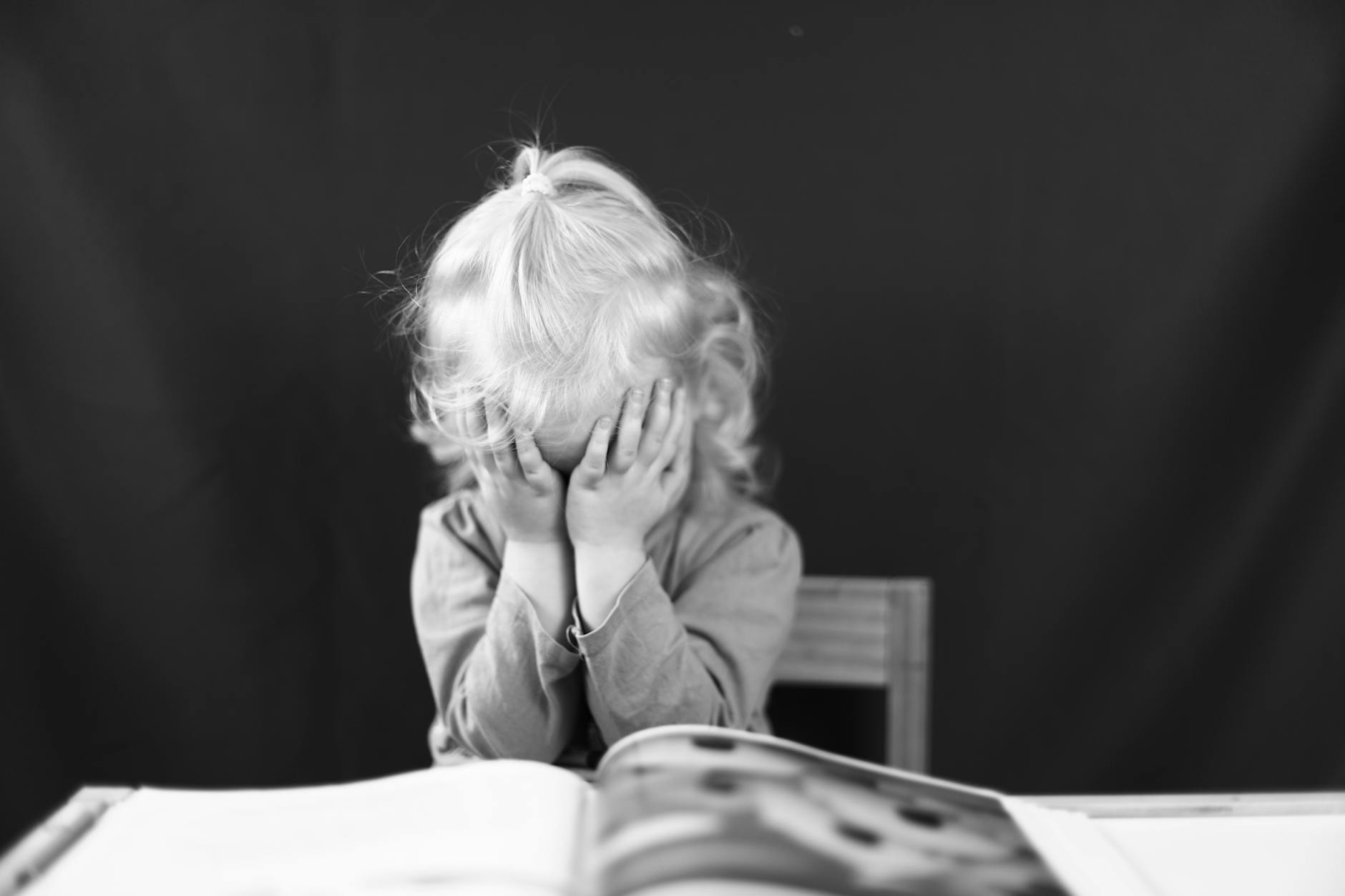 Child Suppressing Emotions