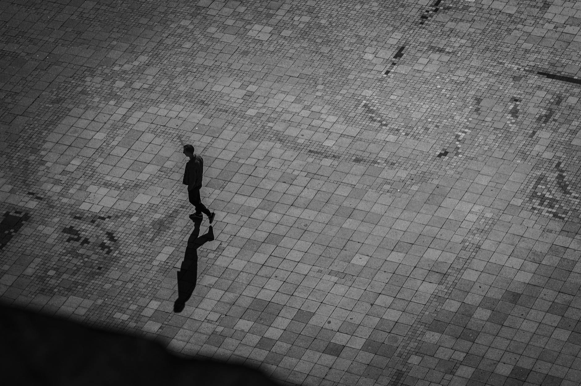 Lonely Figure In Shadows