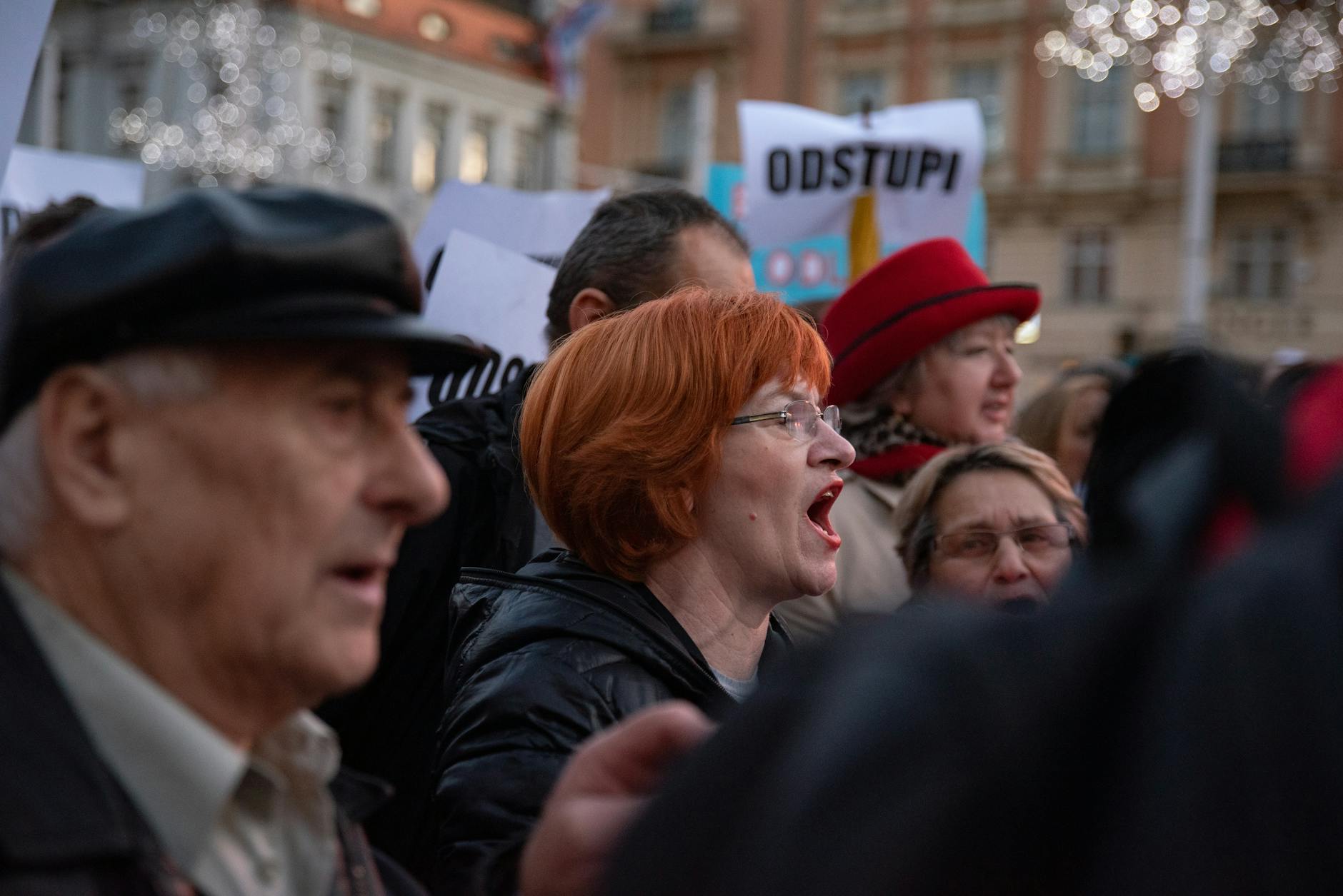 man shouting in crowd