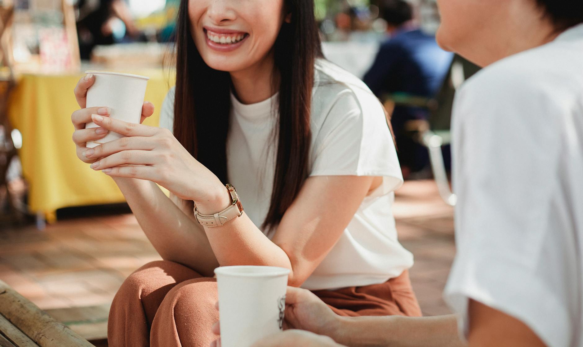 man drinking coffee with women