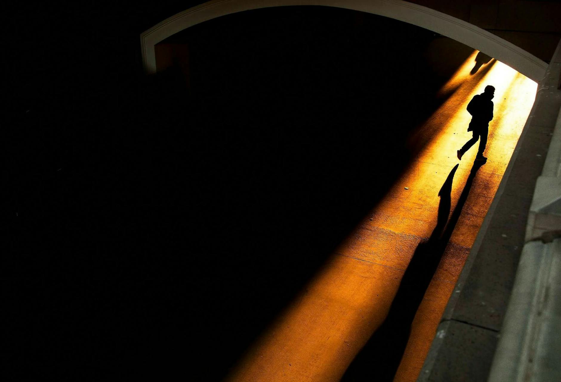 Lonely Figure In Shadows