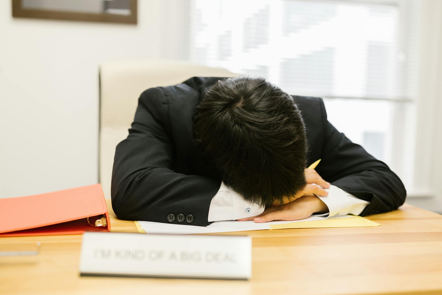 Exhausted Businessperson Resting