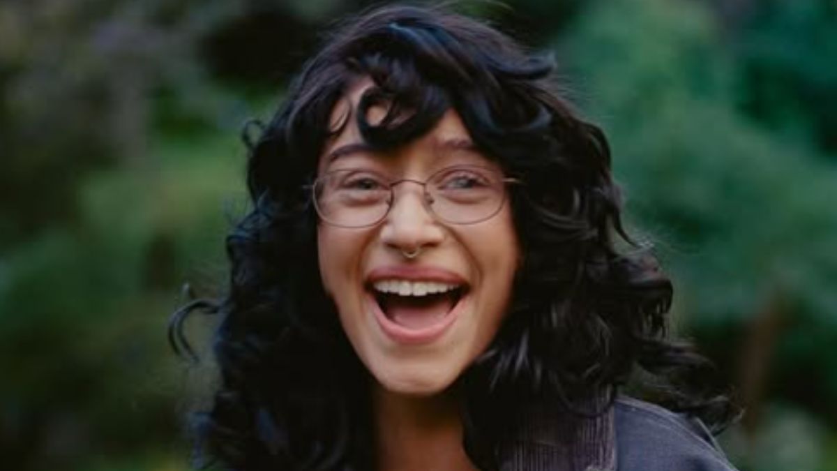 Odessa A’zion’s Sheer-Panel Jumpsuit and Leather Moto Jacket Is the Ultimate Cool-Girl Party Formula