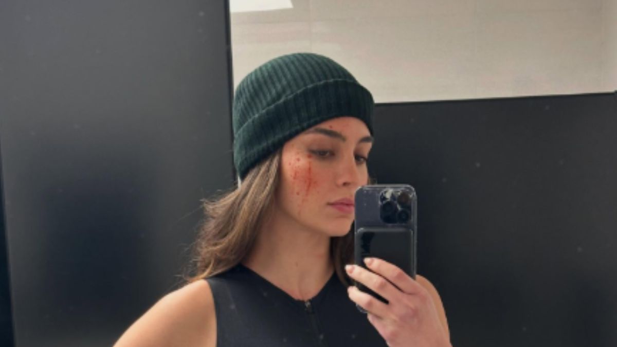 Melissa Barrera’s Fitted Black Bodysuit on the ‘The Copenhagen Test’ Set Is the Action-Ready Look We’re Obsessing Over