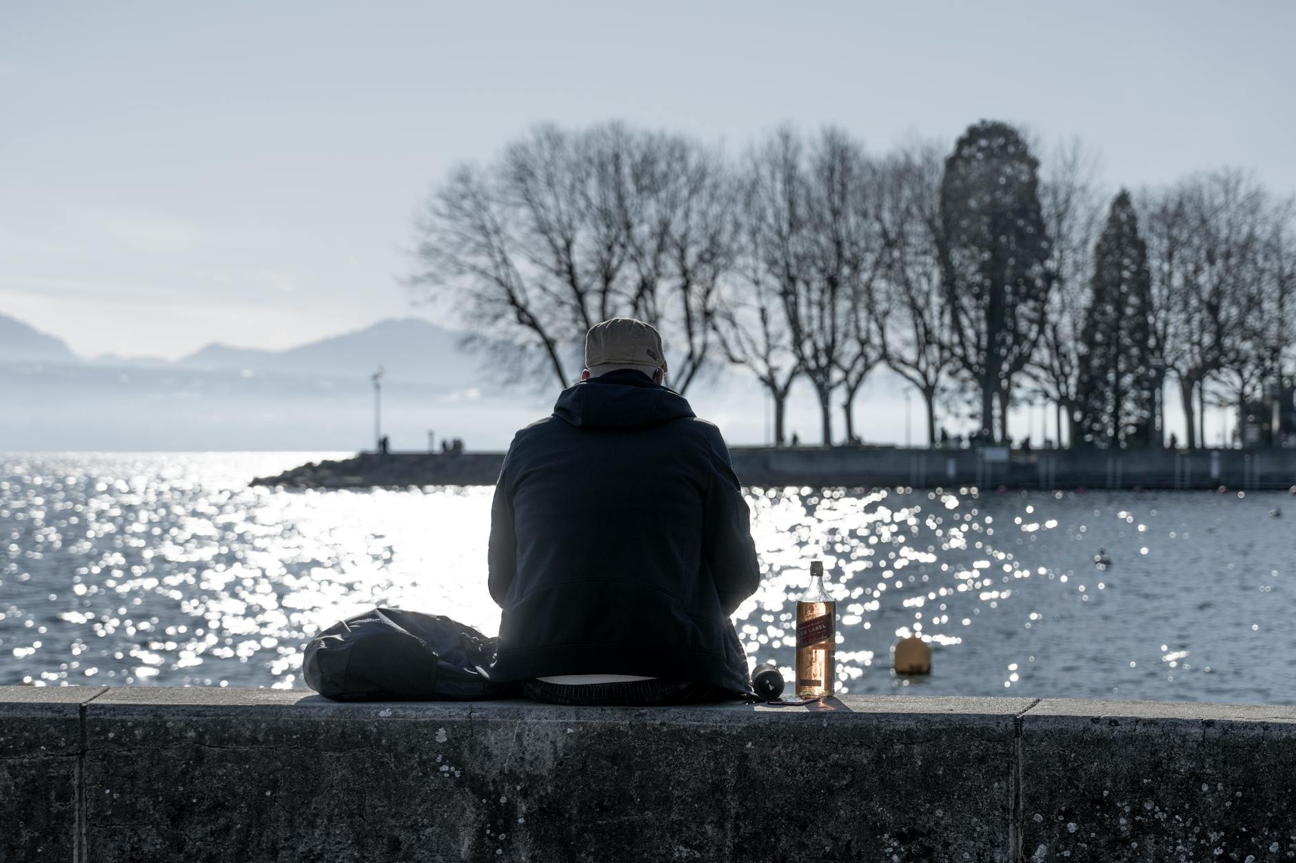 Lonely Person Sitting Alone