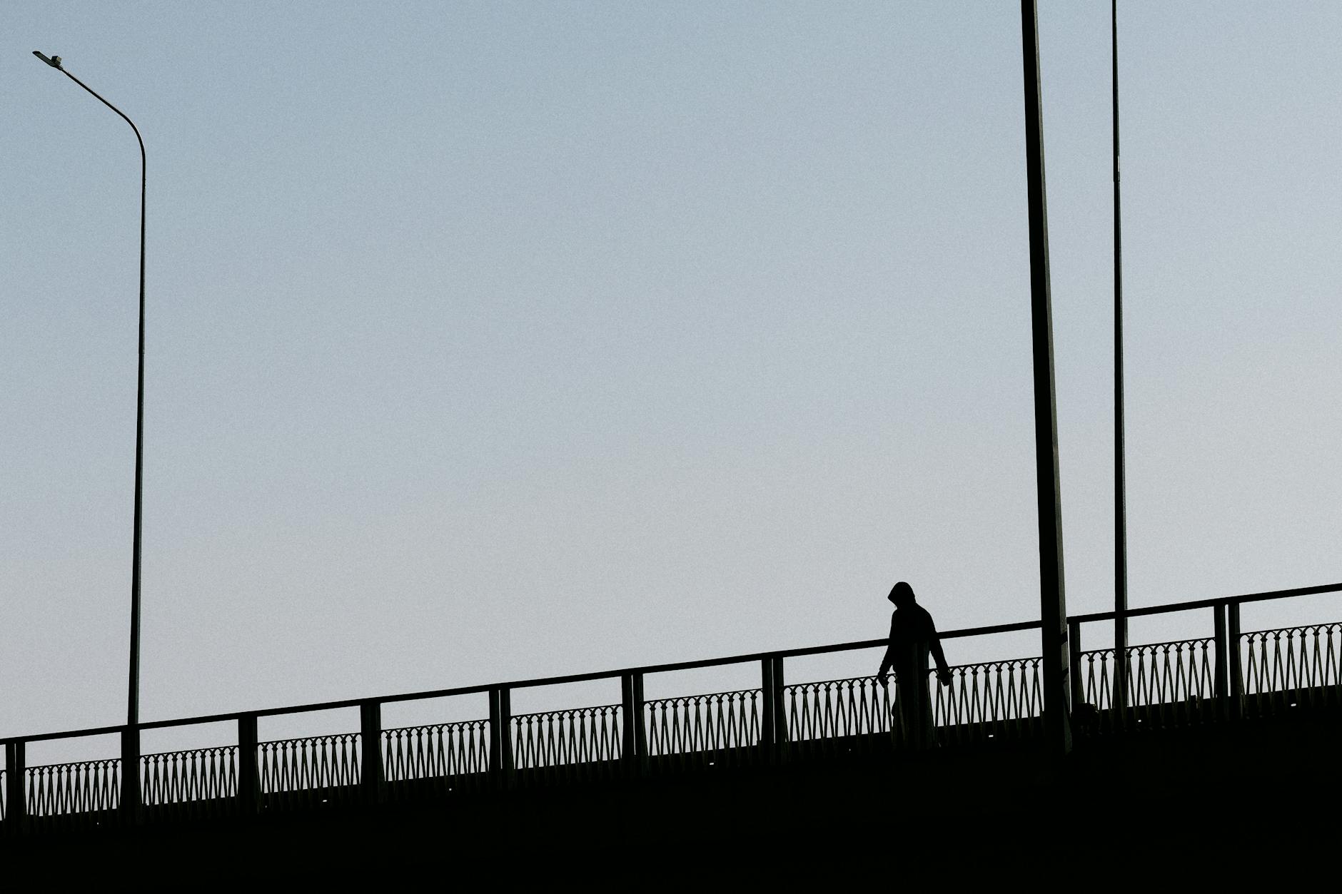 Slumped Figure Silhouette